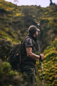 Hiker in an Adirondack Valley with a backpack and hiking poles